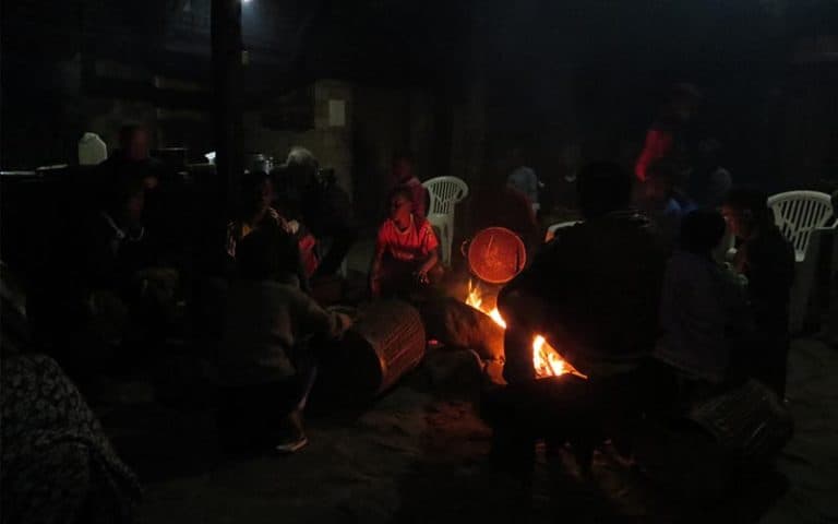 Food, song and community around the evening fire.